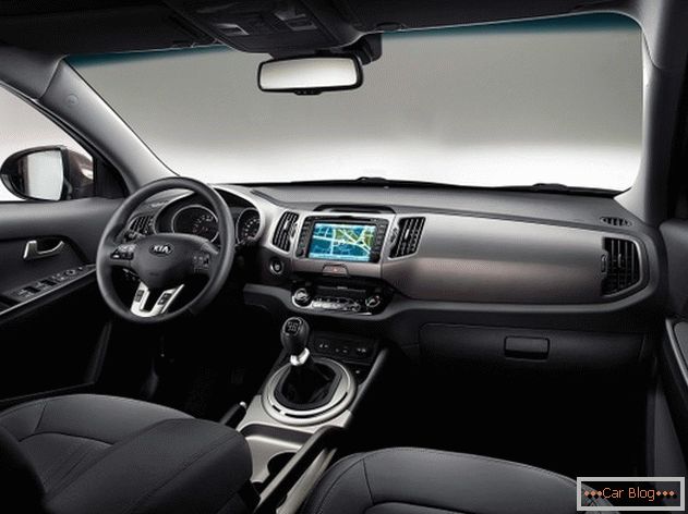 L'interno della vettura Kia Sportage sottolinea l'alto status del proprietario